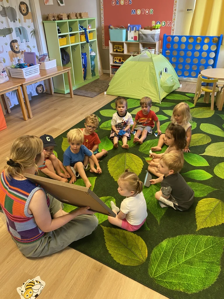 Children reading together during a classroom activity